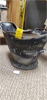 Ash bucket holes in bottom