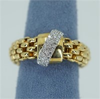 18Kt gold flex ring with one diamond rondelle