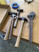 Flat of hammers and pipe wrench