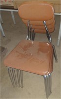 Stack of 4 brown school chairs *times the