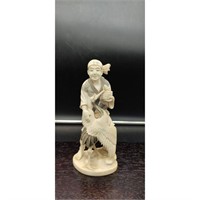 A Carved Japanese Figure Signed
