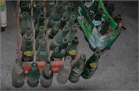 vintage glass soda bottles. In coca cola crate