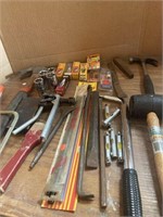 Rubber mallet, hammer, spark plugs, scrapers,