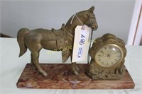 VINTAGE UNITED SELF STARTING CLOCK WITH HORSE