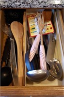 Contents of drawer, cooking utensils, wood spoons