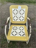 Yellow metal chair