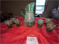 Antique green pitcher and glasses