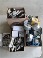 three boxes of electrical parts