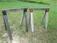two wooden saw horses