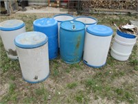 eight plastic barrels