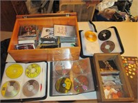 variety of CD's in wooden box