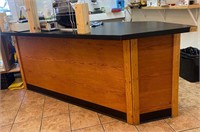 8' checkout counter wood cherry front black top