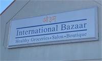 "International Bazaar" outdoor lighted neon sign