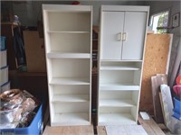 Pair of pressboard cabinets  25x71x12"