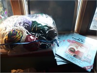 Bag of yarn, iron on doll faces and crayola