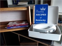 Breadbox with cookbooks and handmixer