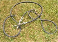 2 gas tank hoses with nozzles.