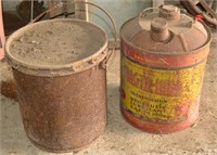 Trac-Tr-Lube Can and rusted grease bucket with