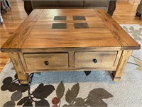 Coffee table with lift