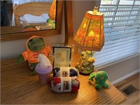Yarn, stuffed animals, lamp, picture