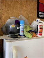 Contents on top of refrigerator, pet ball launcher