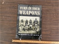 TURN IN YOUR WEAPONS SIGN