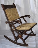 George Hunzinger 19c upholstered rocking chair