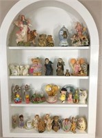 Angels & Figurines on all four shelves