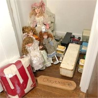 Closet contents: old trucks & dolls