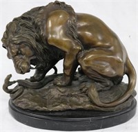 LATE 20TH C. BRONZE DEPICTING LION & SNAKE,