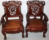 PAIR OF ASIAN CARVED TEAK ARM CHAIRS WITH DRAGON