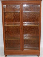 EARLY 20TH C. OAK PRESSED CARVED 2 DOOR BOOKCASE,
