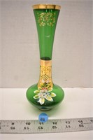 Unmarked green glass vase with gold trim and hand