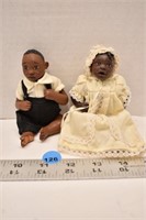 2 small articulating dolls