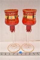 Pair of red and gold candle holders