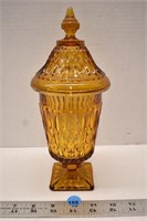 Unmarked amber glass covered jar