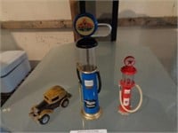 2 small replica gas pumps, cast iron car
