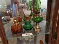 2 green & 1 amber kerosene lamps