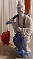 818 - ASIAN ELDER BRINGING HOME FISH 14.5"