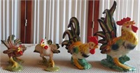 818 - LOT OF 4 ROOSTER FIGURINES