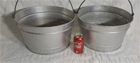 Two aluminum buckets.