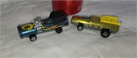 Two Johney Lightning match box cars ( one is