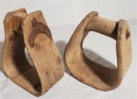 unmatched wooden stirrups