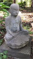 Meditating Concrete Statue