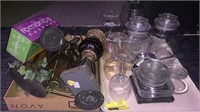 Glass wine cups, small drink jars and candle