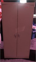 Large metal cabinet measuring 3’ by 18” and 6’