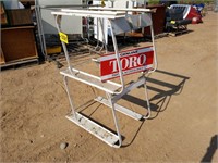 Toro Lawnmower Stand & Sign