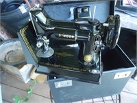 Vintage Singer sewing machine with case