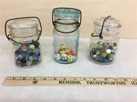 Vintage jars with marbles and dice