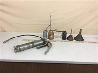 Vintage oil cans and grease gun